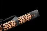 Wooden Embroidered Spring Knife scabbard close-up showing hand-carved leopard embroidery motif, training samurai sword, wooden samurai sword
