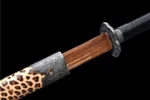 Wooden Embroidered Spring Knife scabbard mouth (koiguchi) and metal collar detail in blackened alloy, training samurai sword, wooden samurai sword