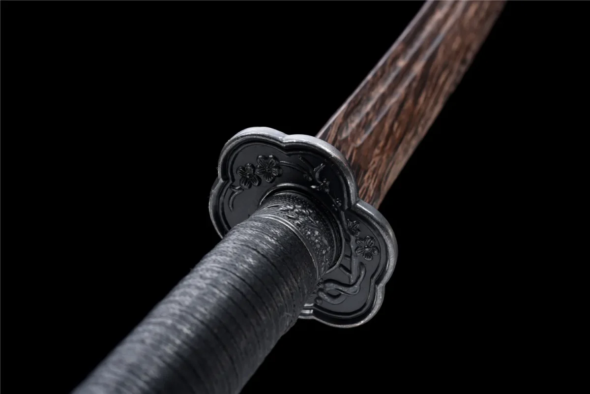 Wooden Embroidered Spring Knife Model D tsuba guard underside showing scalloped pattern, training samurai sword, wooden samurai sword