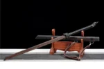 Tang Horizontal Sword Type B angled display on wooden stand showing the full sword.