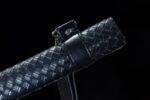Pure black sword close-up of the scabbard texture