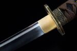 Detailed shot of the katana blade and brass collar