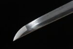 Close-up of the sharp tip of the Blue Water Knife, showcasing its precision and craftsmanship.