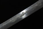 Tang of the Blue Water Knife, showcasing intricate patterns along the blade.