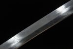 Detailed view of the Blue Water Knife blade, highlighting its refined design and sharp edge.