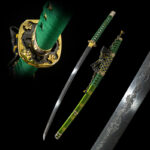 Full view of the Blue Water Knife, showcasing the blade, guard, and intricate scabbard design.