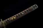 Close-up of the katana handle wrap and ornaments