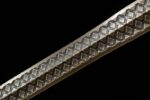Han Xin Sword, a detail shot of the blade's mid-section, showcasing the exquisite interweaving diamond forging pattern.