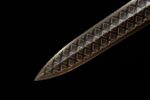 Han Xin Sword, a close-up of the unsheathed tip, highlighting its sharpness and unique diamond pattern.