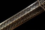 Han Xin Sword, a close-up of the blade, showing the finer texture of the pattern welded steel near the handguard.