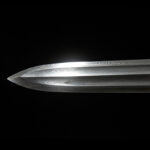 Taotie Sword sharp blade tip, extreme close-up
