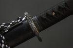 Back side view of Dark Plum katana showing the pommel and handle
