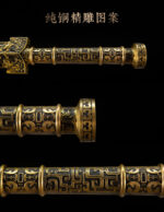 Dragon God Sword, round brass guard, finely carved dragon pattern, close-up of relief details.