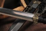 Chibi Xiaohan Sword, close-up of the blade and hilt connection, showcasing its sturdy construction and fine craftsmanship.