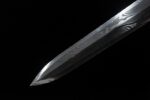Longming Sword blade tip, showing its sharpness and forging texture.