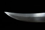 Mongolian knife tip sharpness detail, showcasing fine polishing.