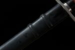 Lightweight European sword, a detail shot of the handle, showcasing the fine black leather wrapping for a comfortable grip.