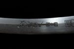 Mongolian knife blade, engraved dragon pattern close-up