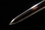 Beast King Sword blade tip, showcasing the sharp form and unique pattern.