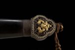 Great Ming Yongle sword, close-up of the detailed ornamentation and connecting parts at the end of the hilt