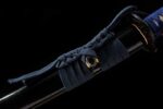 Shadow Katana handle blue wrapping and scabbard joint detail, showing the knot craftsmanship