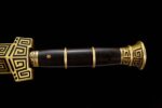 Qin Wang Sword hilt, highlighting the ornate middle rings and texture.