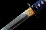Shadow Katana handle and blade joint, close-up showing the golden wrapping and blade pattern