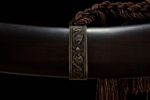 Mongolian knife scabbard tail decoration, close-up of the metal ring pattern